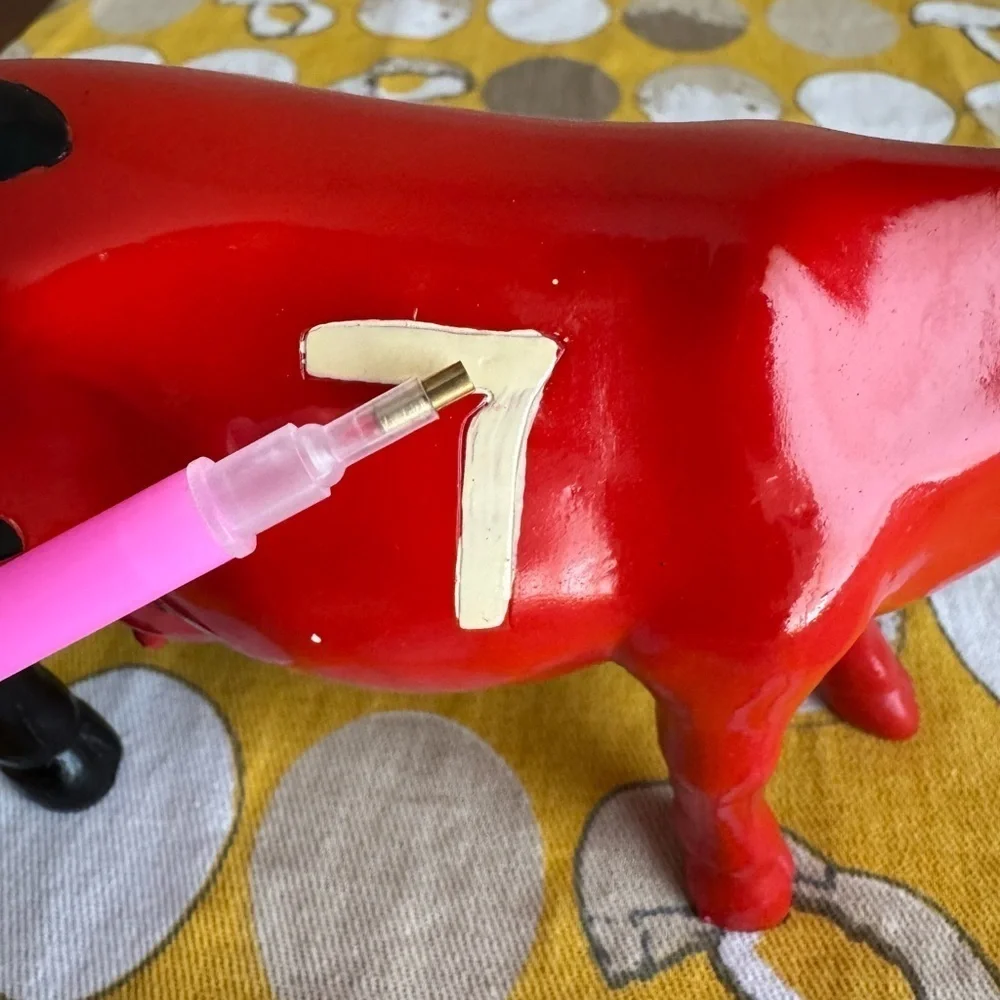 K’s Collection red black striped grid hand painted Cow figurine